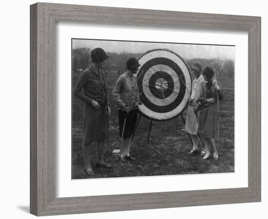 Women examining Archery Target Photograph - Washington, DC-Lantern Press-Framed Art Print