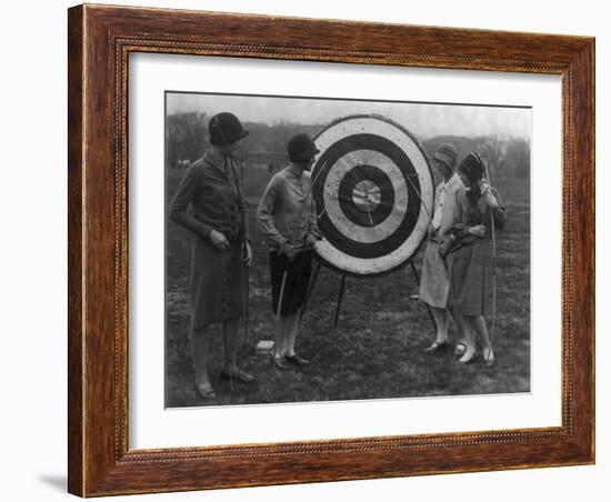 Women examining Archery Target Photograph - Washington, DC-Lantern Press-Framed Art Print