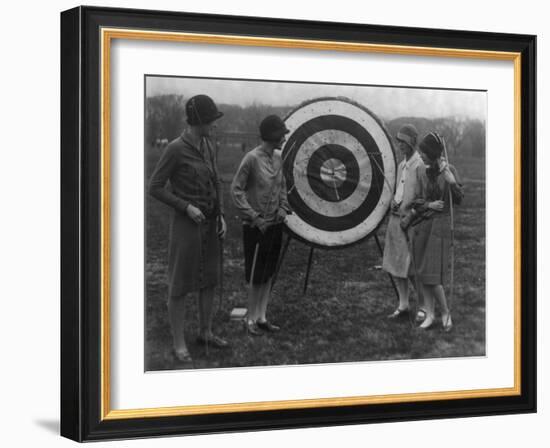 Women examining Archery Target Photograph - Washington, DC-Lantern Press-Framed Art Print