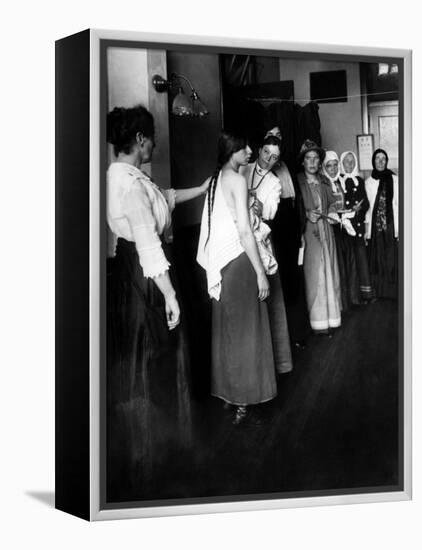 Women Immigrants Undegoing a Physical Examination, Ellis Island, New York, 1910-null-Framed Stretched Canvas