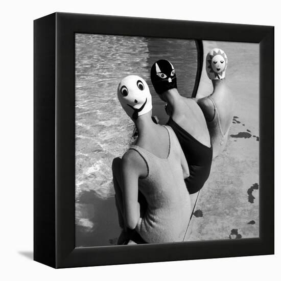 Women Modeling Bathing Caps with Faces on Them-Ralph Crane-Framed Premier Image Canvas