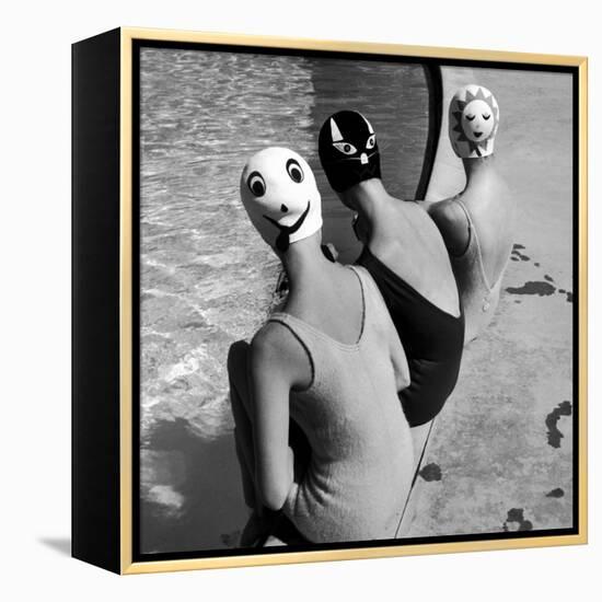 Women Modeling Bathing Caps with Faces on Them-Ralph Crane-Framed Premier Image Canvas