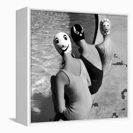 Women Modeling Bathing Caps with Faces on Them-Ralph Crane-Framed Premier Image Canvas