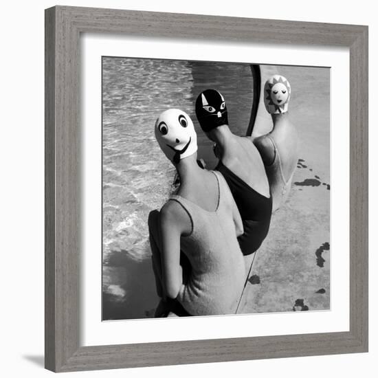 Women Modeling Bathing Caps with Faces on Them-Ralph Crane-Framed Photographic Print