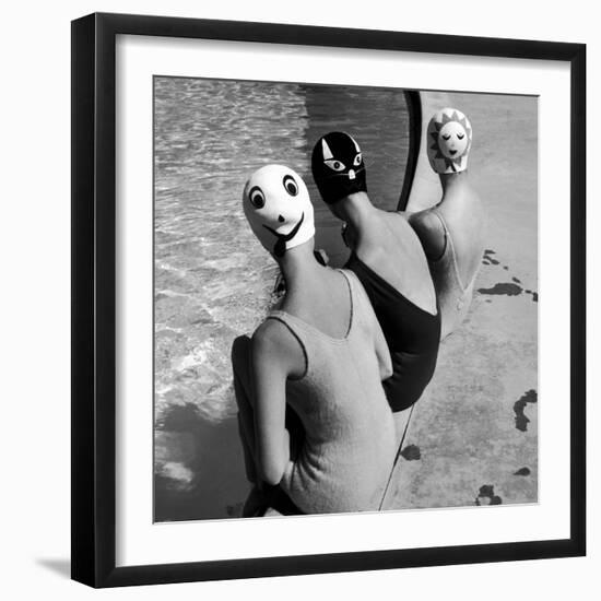 Women Modeling Bathing Caps with Faces on Them-Ralph Crane-Framed Photographic Print