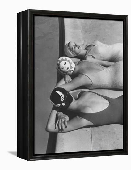 Women Modeling Bathing Caps with Faces on Them-Ralph Crane-Framed Premier Image Canvas