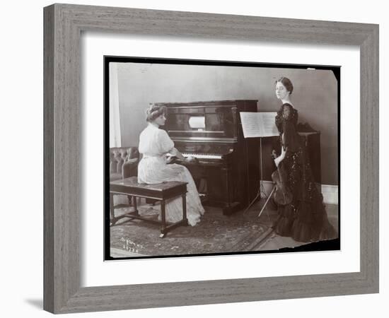 Women Playing a Player Piano and a Violin, New York, 1907-Byron Company-Framed Giclee Print