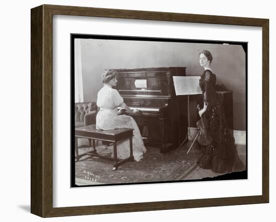 Women Playing a Player Piano and a Violin, New York, 1907-Byron Company-Framed Giclee Print