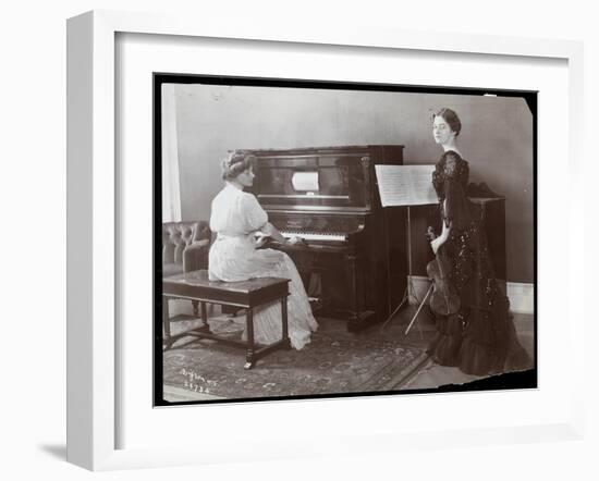 Women Playing a Player Piano and a Violin, New York, 1907-Byron Company-Framed Giclee Print