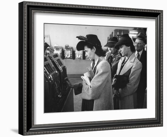 Women Playing Slot Machines at Las Vegas Club-Peter Stackpole-Framed Photographic Print
