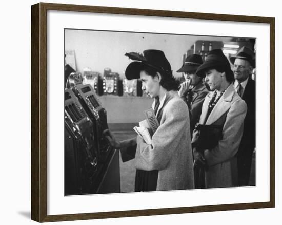 Women Playing Slot Machines at Las Vegas Club-Peter Stackpole-Framed Photographic Print