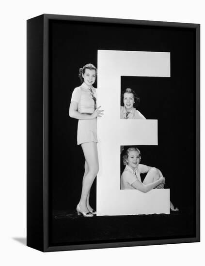 Women Posing with Huge Letter E-Everett Collection-Framed Premier Image Canvas