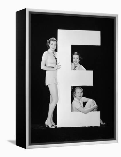 Women Posing with Huge Letter E-Everett Collection-Framed Premier Image Canvas