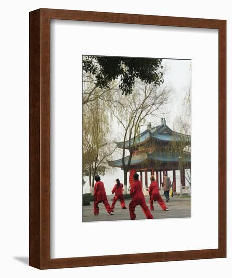 Women Practising Tai Chi in Front of a Pavilion on West Lake, Hangzhou, Zhejiang Province, China-Kober Christian-Framed Photographic Print