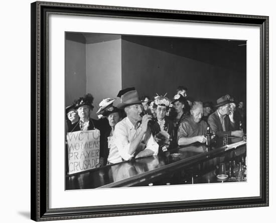 Women's Christian Temperance Union Members Invading Bar While Customers Remain Indifferent-Peter Stackpole-Framed Photographic Print