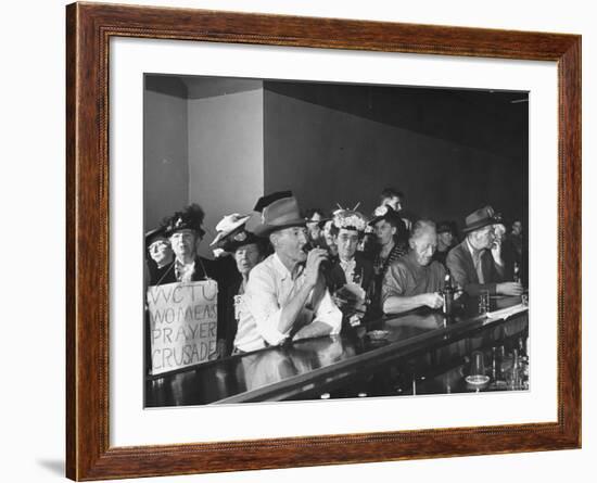 Women's Christian Temperance Union Members Invading Bar While Customers Remain Indifferent-Peter Stackpole-Framed Photographic Print