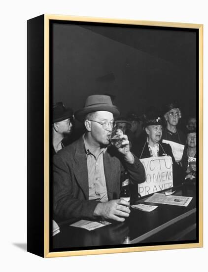 Women's Christian Temperance Union Members Raiding Local Bar Carrying Signs-Peter Stackpole-Framed Premier Image Canvas