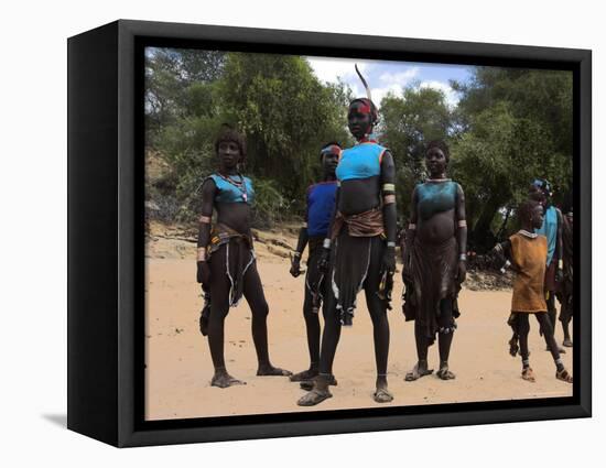 Women Sing and Dance Before the Bull Jumping, Turmi, Ethiopia-Jane Sweeney-Framed Premier Image Canvas