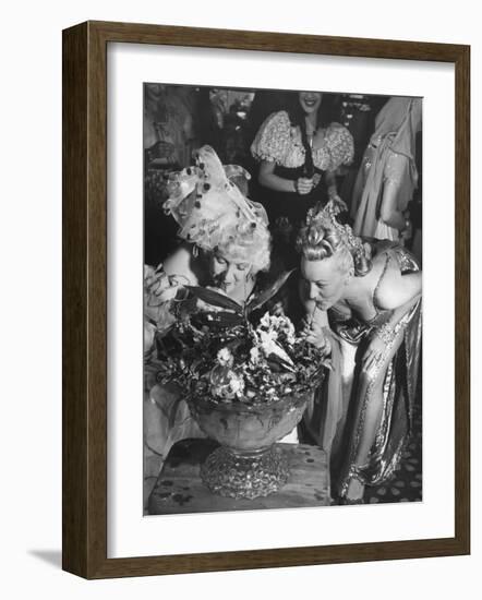 Women Sipping Punch Out of Big Bowl at Globetrotters Costume Party-Peter Stackpole-Framed Photographic Print