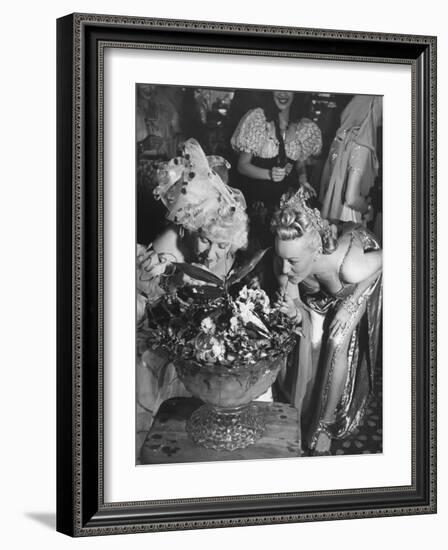 Women Sipping Punch Out of Big Bowl at Globetrotters Costume Party-Peter Stackpole-Framed Photographic Print