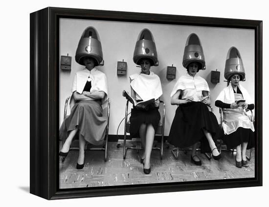 Women Sitting and Reading under Hairdryers at Rockefeller Center "Pamper Club"-Nina Leen-Framed Premier Image Canvas