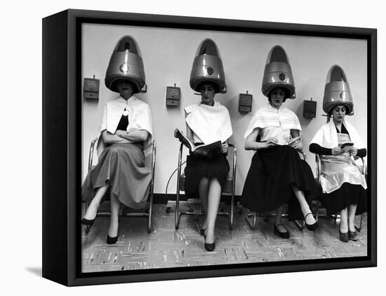 Women Sitting and Reading under Hairdryers at Rockefeller Center "Pamper Club"-Nina Leen-Framed Premier Image Canvas