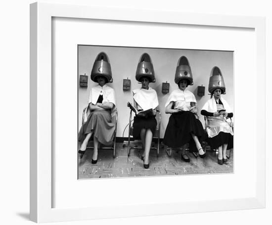 Women Sitting and Reading under Hairdryers at Rockefeller Center "Pamper Club"-Nina Leen-Framed Photographic Print