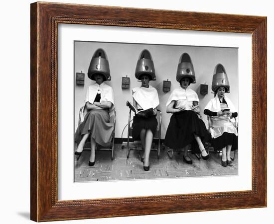 Women Sitting and Reading under Hairdryers at Rockefeller Center "Pamper Club"-Nina Leen-Framed Photographic Print