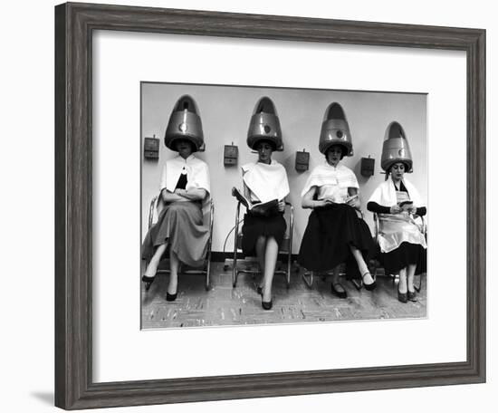 Women Sitting and Reading under Hairdryers at Rockefeller Center "Pamper Club"-Nina Leen-Framed Photographic Print