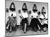 Women Sitting and Reading under Hairdryers at Rockefeller Center "Pamper Club"-Nina Leen-Mounted Photographic Print