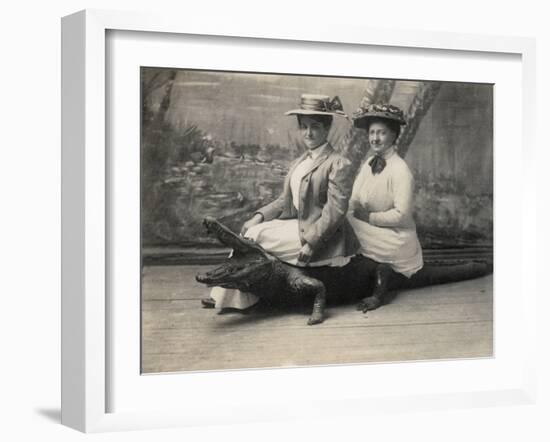 Women Sitting on a Stuffed Alligator, C.1905-null-Framed Photographic Print