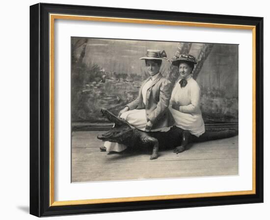 Women Sitting on a Stuffed Alligator, C.1905-null-Framed Photographic Print