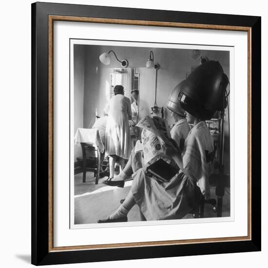 Women Sitting under Hair Dryers at the Hairdressers-Henry Grant-Framed Photographic Print