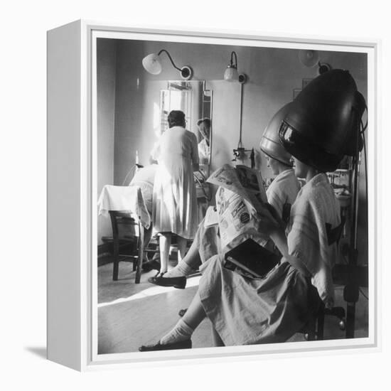 Women Sitting under Hair Dryers at the Hairdressers-Henry Grant-Framed Premier Image Canvas