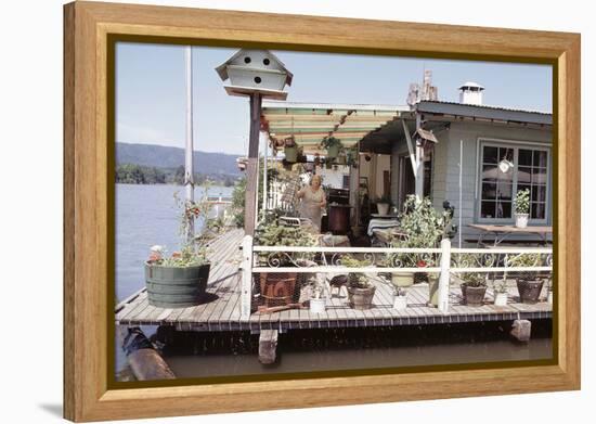 Women Standing Amidst Potted Plants on Floating Home Deck in Portage Bay, Seattle, Wa, 1971-Michael Rougier-Framed Premier Image Canvas