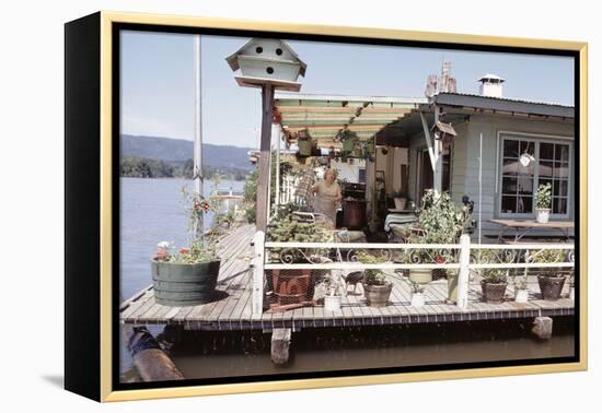 Women Standing Amidst Potted Plants on Floating Home Deck in Portage Bay, Seattle, Wa, 1971-Michael Rougier-Framed Premier Image Canvas