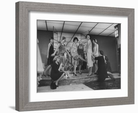 Women Trying on Costumes for the Roaring 20's Ball-Yale Joel-Framed Photographic Print