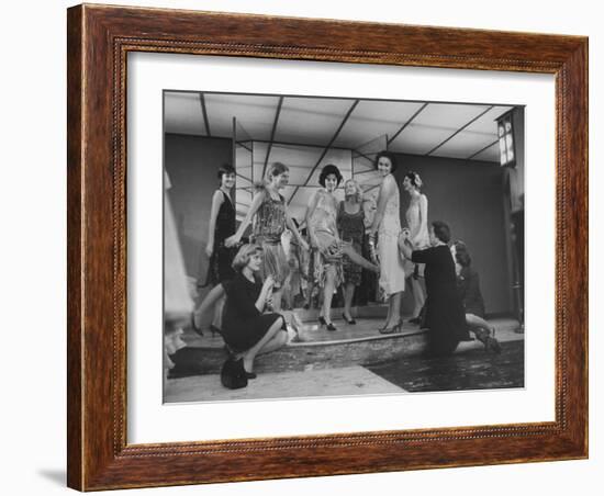 Women Trying on Costumes for the Roaring 20's Ball-Yale Joel-Framed Photographic Print