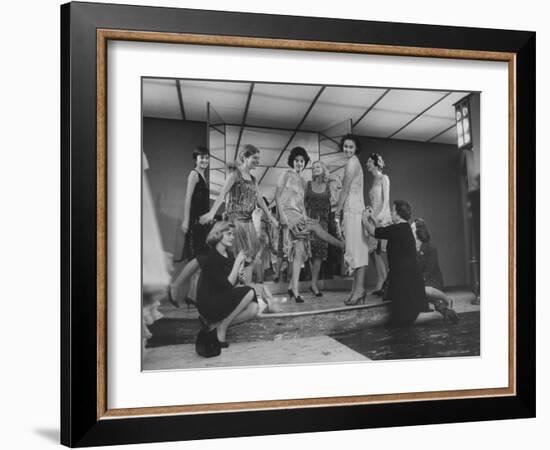 Women Trying on Costumes for the Roaring 20's Ball-Yale Joel-Framed Photographic Print