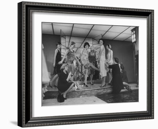 Women Trying on Costumes for the Roaring 20's Ball-Yale Joel-Framed Photographic Print