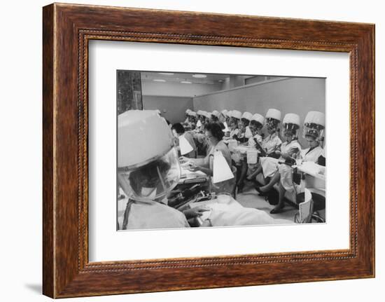 Women under Hair Dryers Getting Hair Styled in Beauty Salon at Saks Fifth Ave. Department Store-Alfred Eisenstaedt-Framed Photographic Print