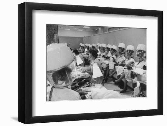 Women under Hair Dryers Getting Hair Styled in Beauty Salon at Saks Fifth Ave. Department Store-Alfred Eisenstaedt-Framed Photographic Print