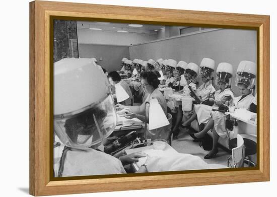 Women under Hair Dryers Getting Hair Styled in Beauty Salon at Saks Fifth Ave. Department Store-Alfred Eisenstaedt-Framed Premier Image Canvas