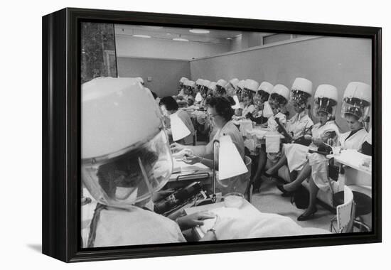 Women under Hair Dryers Getting Hair Styled in Beauty Salon at Saks Fifth Ave. Department Store-Alfred Eisenstaedt-Framed Premier Image Canvas