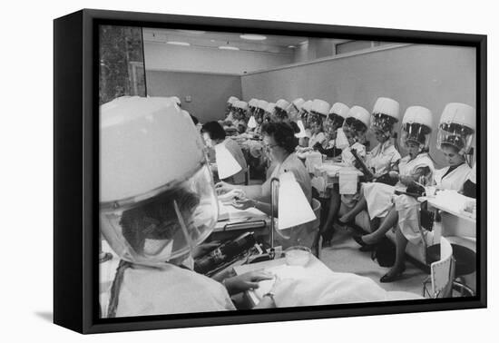 Women under Hair Dryers Getting Hair Styled in Beauty Salon at Saks Fifth Ave. Department Store-Alfred Eisenstaedt-Framed Premier Image Canvas