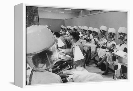 Women under Hair Dryers Getting Hair Styled in Beauty Salon at Saks Fifth Ave. Department Store-Alfred Eisenstaedt-Framed Premier Image Canvas