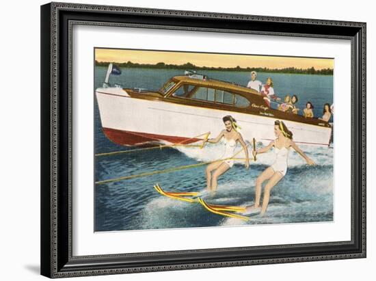 Women Waterskiing by Motorboat-null-Framed Art Print