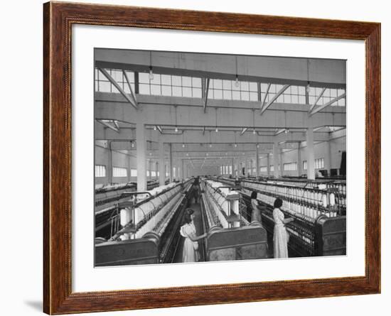 Women Working in the Spinning Room of Textile Mill-null-Framed Photographic Print