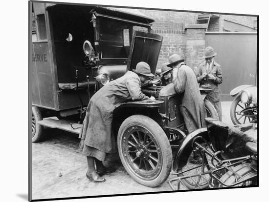 Women Working on an Automobile Engine Showing Shortage of Men During World War I-null-Mounted Photographic Print