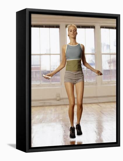 Women Working Out with Jump Rope in Fitness Studio, New York, New York, USA-Chris Trotman-Framed Premier Image Canvas